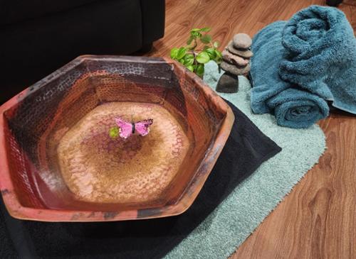 Enjoy a clean, one on one, pedicure and manicure with a hot stone massage and fresh polish